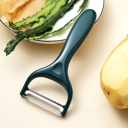Y-Shaped Vegetable Peeler in Stainless Steel with Green Grip - Image 3