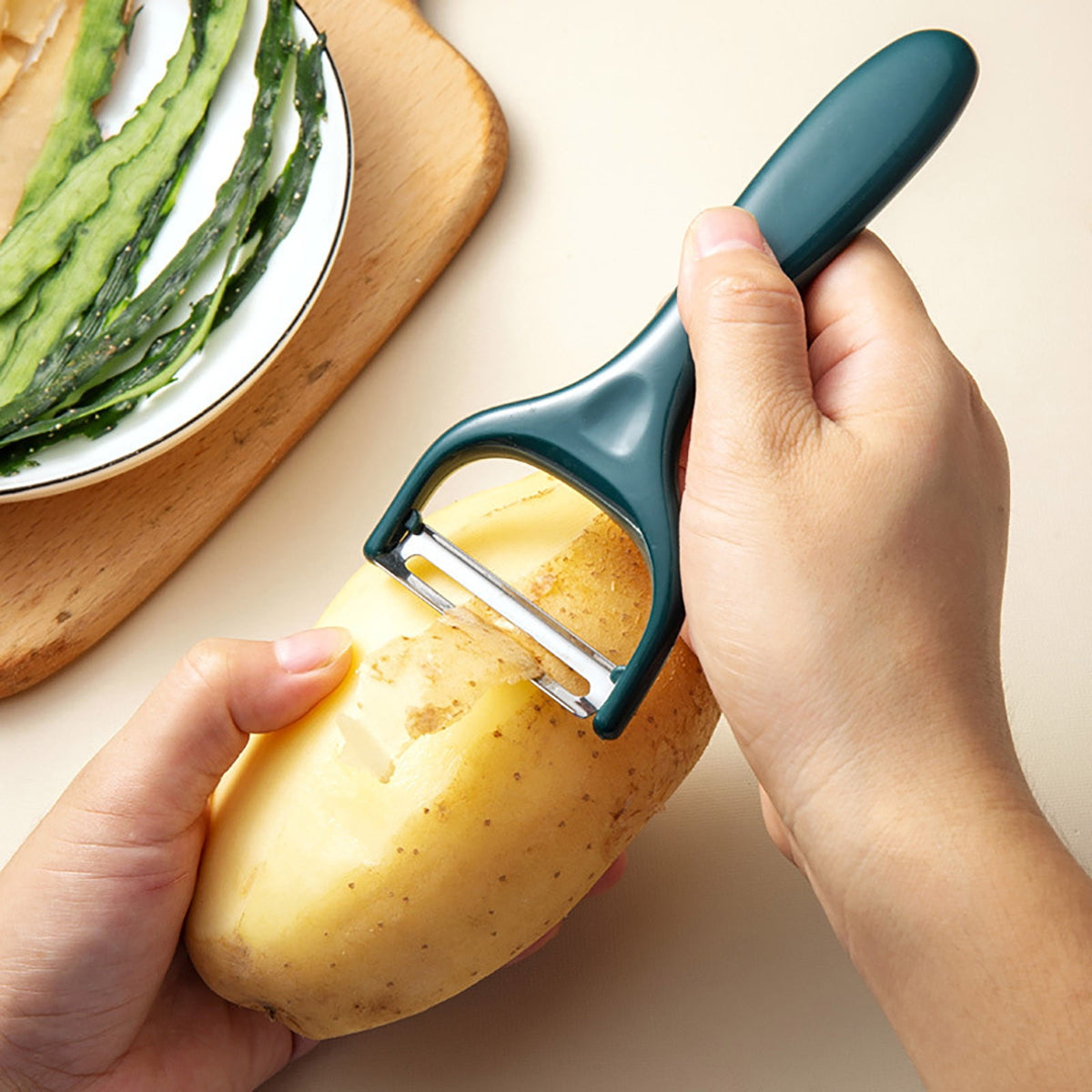 Y-Shaped Vegetable Peeler in Stainless Steel with Green Grip - Image 4